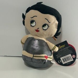 Black and Cream Stuffed Doll